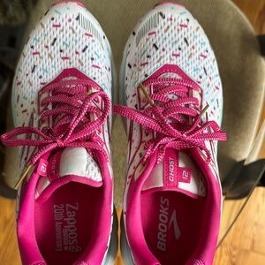 Brooks Pink and White Athletic Shoes with Vibrant Laces